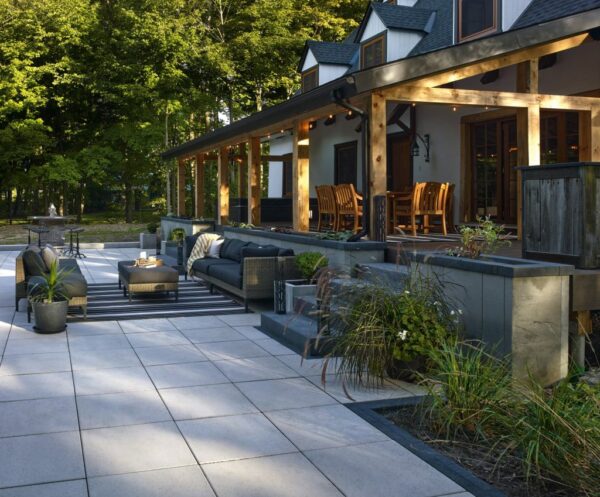 An elegant & modern patio created with Artex System Accessories provided by Hard-Co's landscape supply in Whitby